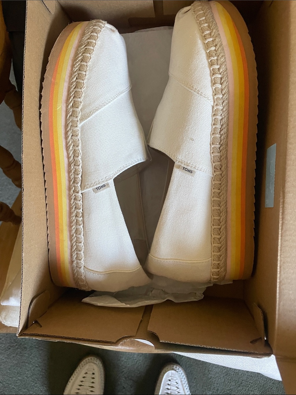 TOMS Kids Cream Canvas Slip-On with Yellow & Orange Striped Sole
